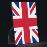 United Kingdom Union Jack Flag of British Colonies Plaque<br><div class="desc">The Union Jack, a tapestry woven with threads of history, flutters proudly, a symbol of a nation forged in unity. Its story begins in 1606, when King James VI of Scotland ascended to the English throne as King James I. To commemorate the union of these two kingdoms, he commissioned a...</div>