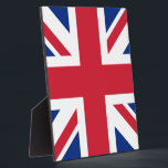 United Kingdom Union Jack Flag of British Colonies Plaque<br><div class="desc">The Union Jack, a tapestry woven with threads of history, flutters proudly, a symbol of a nation forged in unity. Its story begins in 1606, when King James VI of Scotland ascended to the English throne as King James I. To commemorate the union of these two kingdoms, he commissioned a...</div>