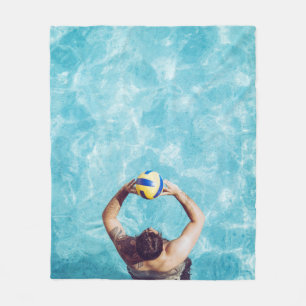 Unknown person playing beach volleyball fleece blanket