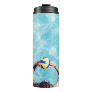 Unknown person playing beach volleyball thermal tumbler