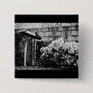 up against the rain 15 cm square badge