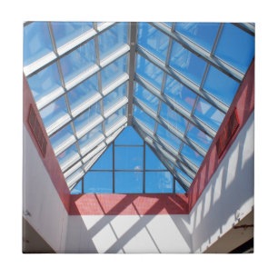 Upward view on the triangular glass roof tile