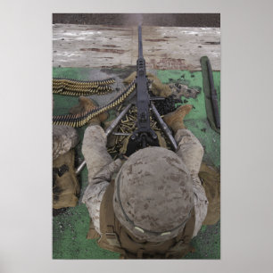 US Marine fires an M2 50-calibre machine gun Poster