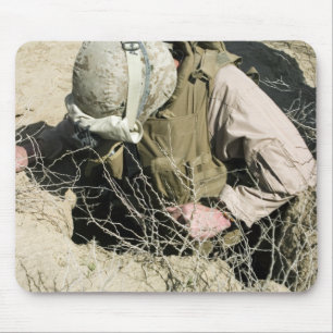 US Marine jumps down a hole Mouse Pad