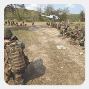 US Marines provide security as a UH-1N Square Sticker