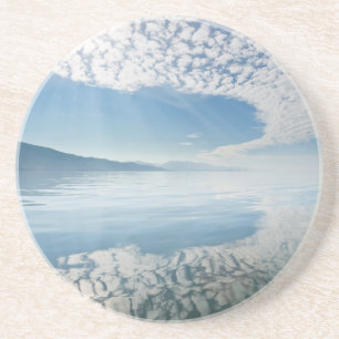 USA, Alaska, Freshwater Bay. Clouds Reflected Coaster