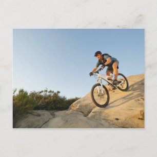 USA, California, Laguna Beach, Man cycling down Postcard