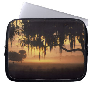 USA, Florida, Lake Kissimmee. Sunrise silhouette Laptop Sleeve