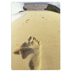 USA, Hawaii, Maui, Makena Beach, Footprint and Clipboard