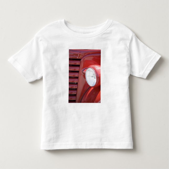 USA, Maine, Owl's Head. Headlight and partial Toddler T-Shirt (Front)