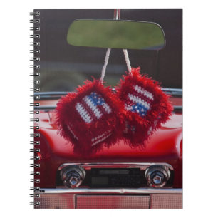USA, Massachusetts, Gloucester. Fuzzy dice with Notebook