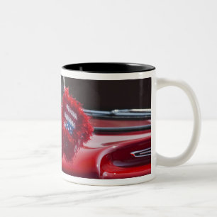 USA, Massachusetts, Gloucester. Fuzzy dice with Two-Tone Coffee Mug