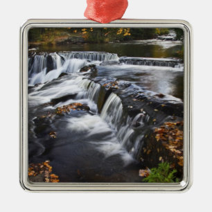 USA, Michigan, Upper Peninsula. Bond Falls and Metal Tree Decoration