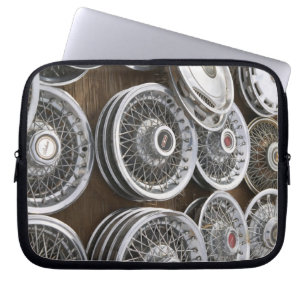 USA, New Mexico, Prewitt: Auto Hubcaps / Rt. 66 Laptop Sleeve