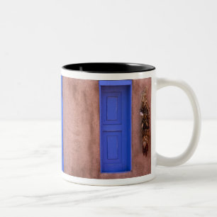 USA, New Mexico, Santa Fe. View of blue door and Two-Tone Coffee Mug