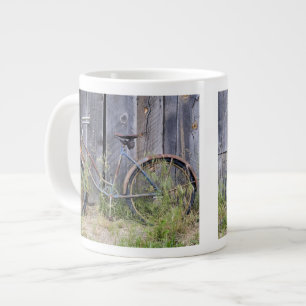 USA, Oregon, Bend. A dilapidated old bike Large Coffee Mug