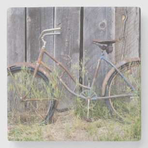 USA, Oregon, Bend. A dilapidated old bike Stone Coaster