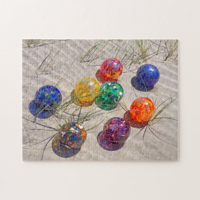 USA, Oregon. Colourful Glass Floats On Sand Dune Jigsaw Puzzle (Horizontal)