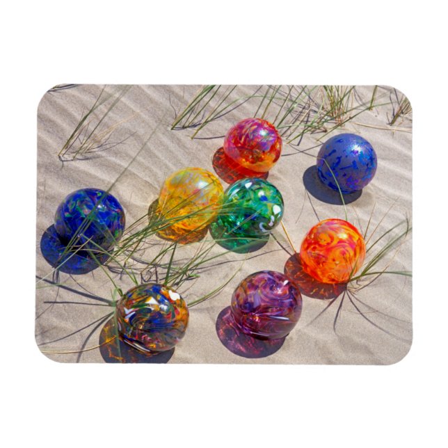 USA, Oregon. Colourful Glass Floats On Sand Dune Magnet (Horizontal)