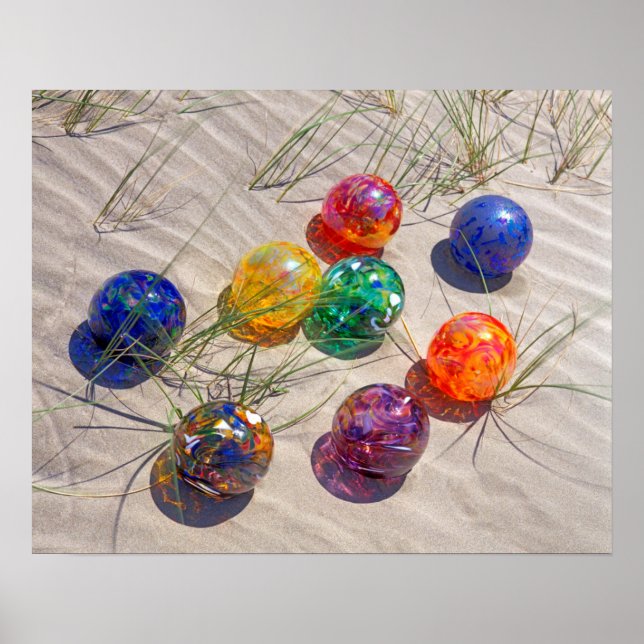 USA, Oregon. Colourful Glass Floats On Sand Dune Poster (Front)