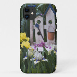 USA, Pennsylvania. Garden irises grow around iPhone 11 Case