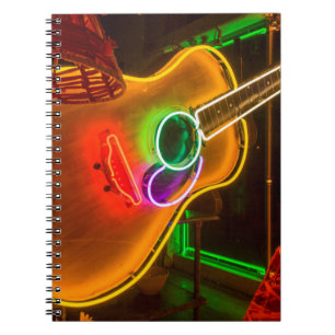 USA, Texas, Austin. Neon Guitar At Blackmail Notebook