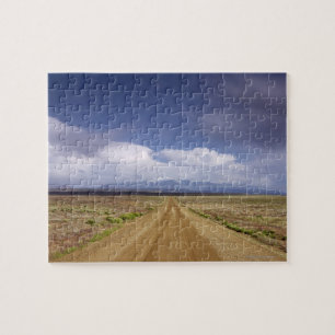 USA, Utah, Dirt road crossing landscape Jigsaw Puzzle