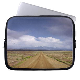 USA, Utah, Dirt road crossing landscape Laptop Sleeve