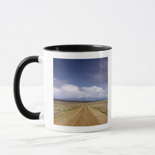 USA, Utah, Dirt road crossing landscape Mug
