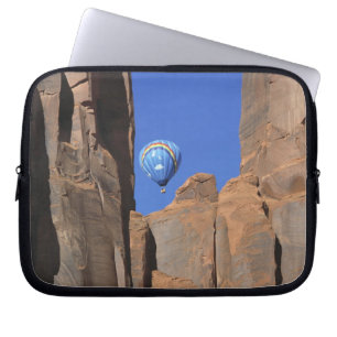 USA, Utah, Monument Valley. A rainbow hot-air Laptop Sleeve