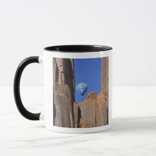 USA, Utah, Monument Valley. A rainbow hot-air Mug
