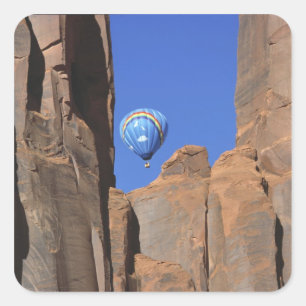 USA, Utah, Monument Valley. A rainbow hot-air Square Sticker