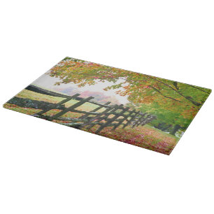 USA, Vermont. Fence under fall foliage. Cutting Board