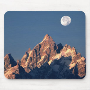 USA, Wyoming, Grand Teton NP. A full moon sets Mouse Pad