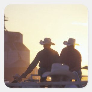 USA, Wyoming, Pine Bluffs. Two men shake Square Sticker