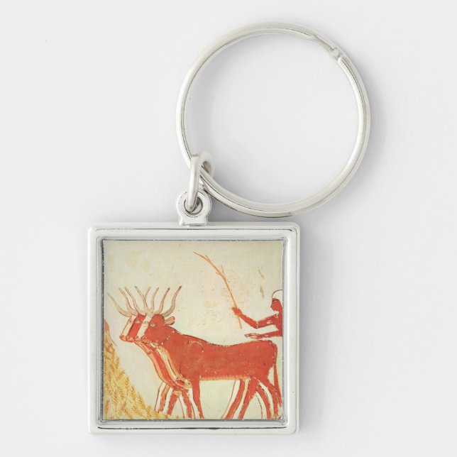 Using cows to trample wheat key ring (Front)