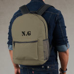Utility Military Style Army Green Printed Backpack<br><div class="desc">A military style backpack in army green buff brown with a personalised monogram initial in a utilitarian stencil style typography in black. The perfect gift or accessory for any soldier or military personnel.</div>