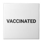Vaccinated black white minimalist custom text ceramic tile<br><div class="desc">Vaccinated black and white simple minimalist modern custom text ceramic tile.
Customisable black text,  white solid plan background.
Write your name,  text or monogram or favourite phrase or quote.
minimalist simple elegant style.
black and white.</div>