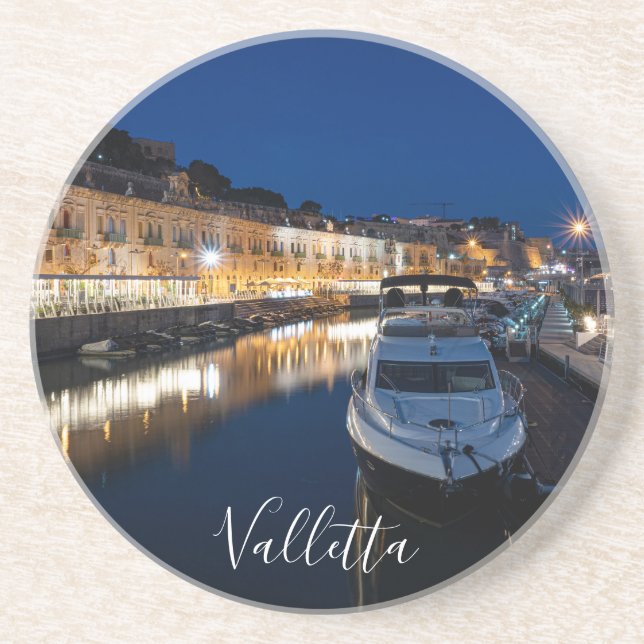 Valletta waterfront district with small harbor coaster (Front)