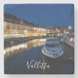 Valletta waterfront district with small harbor stone coaster