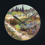Van Gogh Flowering Garden At Arles Floral Fine Art Round Clock<br><div class="desc">Vincent Van Gogh Flowering Garden At Arles With Path Fine Art Vincent Willem van Gogh was a Post-Impressionist painter whose work had a far-reaching influence on 20th-century art. His output includes portraits, self portraits, landscapes and still lifes of cypresses, flower fields, trees in bloom, gardens, wheat fields and flowers. Between...</div>