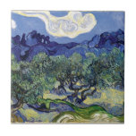Van Gogh - Olive Trees In A Mountainous Landscape Tile<br><div class="desc">Vincent Van Gogh's Olive Trees In A Mountainous Landscape. Oil on canvas from 1889, Van Gogh painted this olive grove landscape with the Alpilles mountains in the background while staying as a patient at the Saint Remy asylum in a style meant to complement his famous Starry Night painting. Unlike similar...</div>
