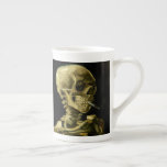 Van Gogh Smoking Skeleton Bone China Mug<br><div class="desc">Bone China Mug featuring Vincent van Gogh’s oil painting Skull of a Skeleton with Burning Cigarette (1885-86). A great gift for fans of Post-Impressionism and Dutch art!</div>
