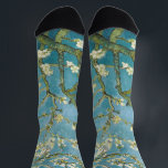 Van Gogh's Almond Blossoms Classic Impressionism Socks<br><div class="desc">"Almond Blossom" is one of Vincent van Gogh's most iconic and vibrant works, created in 1890. The painting features a delicate and fresh depiction of blooming almond branches set against a clear blue sky. Van Gogh’s brushstrokes are loose yet expressive, capturing the energy and beauty of the blossoming flowers. The...</div>