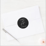 Vanessa Black Modern Wedding Classic Round Sticker<br><div class="desc">Modern wedding stickers featuring a simple and minimal layout with your names and an elegant ampersand in a large format.  The colour theme is white over a black background and may be changed in the design editing tool.</div>