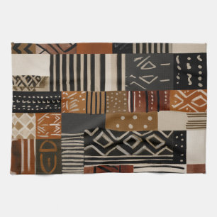 Variations of African motifs in earth tones Tea Towel