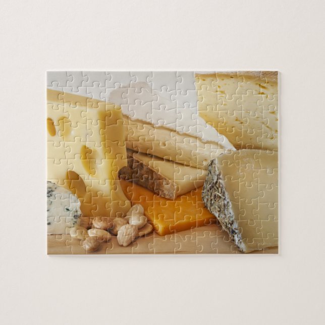 Various cheeses on chopping board jigsaw puzzle (Horizontal)