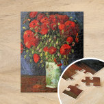 Vase with Red Poppies | Vincent van Gogh Jigsaw Puzzle<br><div class="desc">Vase with Red Poppies by Vincent van Gogh is a captivating still-life painting that highlights the artist’s vibrant use of colour and expressive brushwork. The painting features a simple earthen vase filled with bold, crimson poppies, set against a textured, muted background. The contrast between the vivid flowers and the subdued...</div>