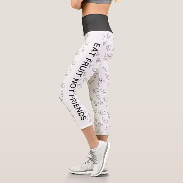 Vegan Eat fruit not friends white cartoon animals Capri Leggings (Left)