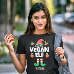 Vegan elf family matching christmas outfit name T-Shirt<br><div class="desc">Get into the holiday spirit with this fun Vegan elf t-shirt which is part of a matching family elf outfit collection containing gifts for any member of the family. Perfect for any Christmas family reunion, or as a family matching pajama, this t-shirt features a cute elf hat and legs, with...</div>